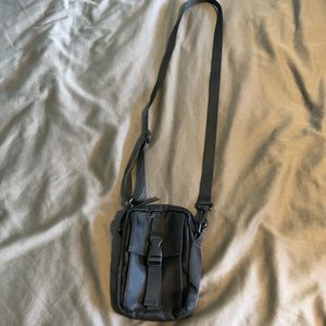 Small black bag with front pocket from Dolls Kill.